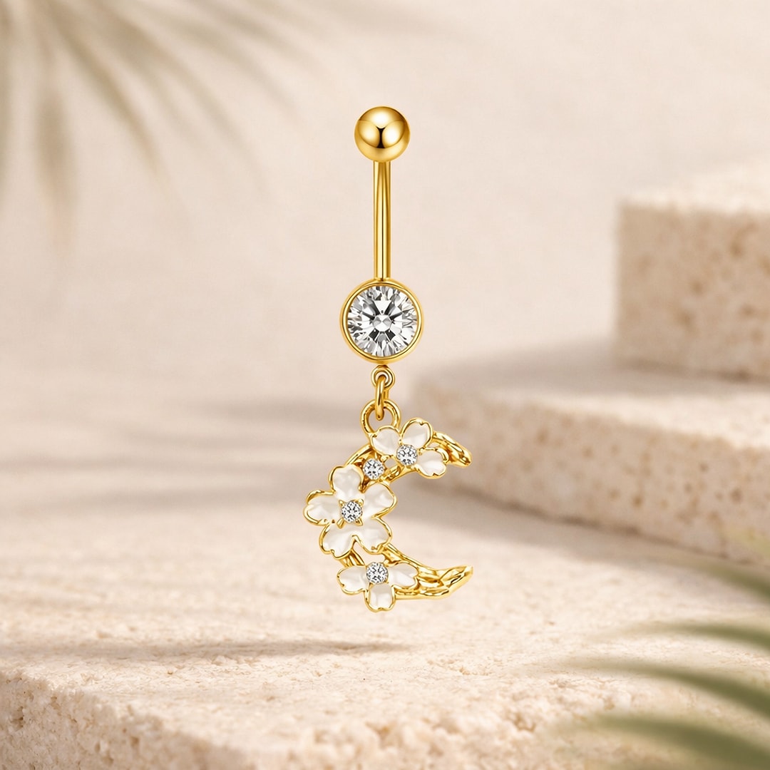 Banane de nombril dorée avec cristal rond et pendentif lune ornée de fleurs blanches et petits strass