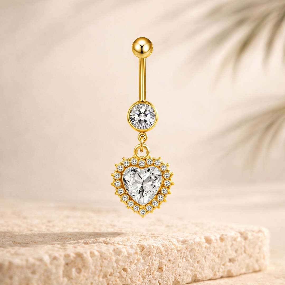 Banane de nombril dorée avec pierre ronde et pendentif cœur en cristal blanc cerné de petits strass