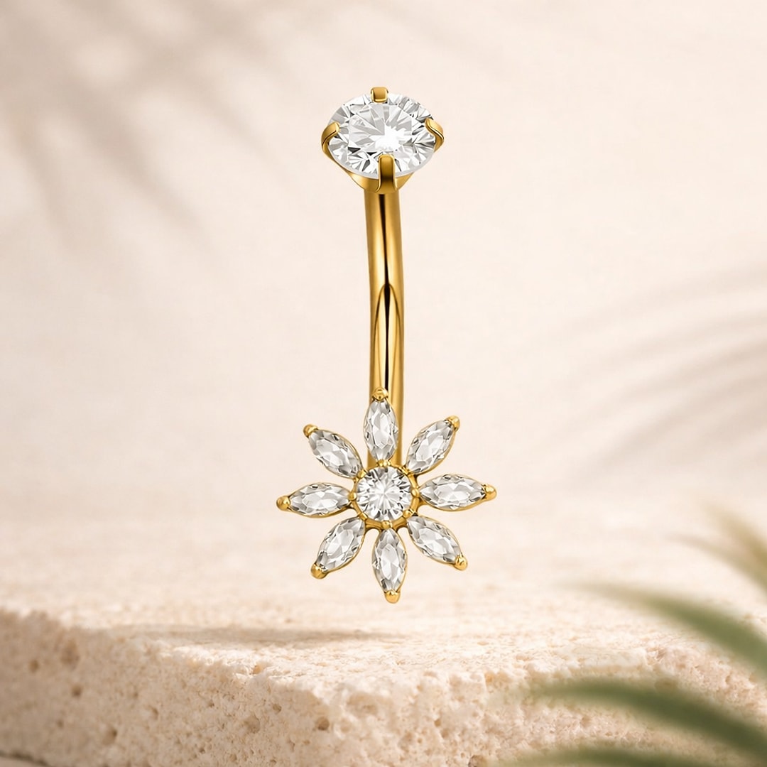 Banane de nombril en titane doré avec fleur de zircons blancs et pierre ronde sertie griffes