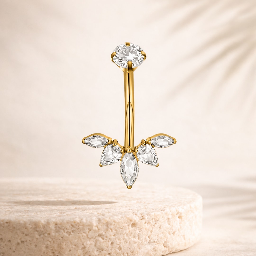 Bijou de nombril en titane doré, zircon rond en haut et éventail de cinq zircons blancs en pétales
