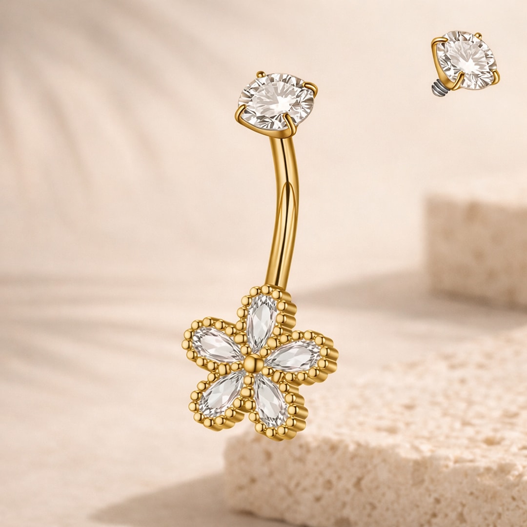 Piercing nombril acier doré, fleur cinq pétales en cristaux et pierre ronde, tige courbe 1,6 x 10 mm